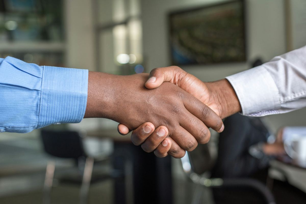 Handshake sealing a confidential advisory engagement